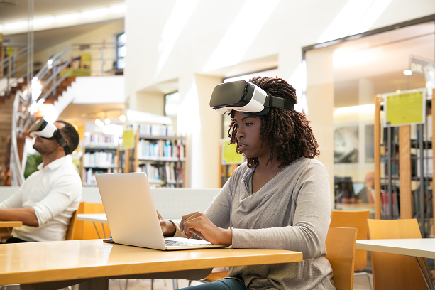 Students using VR headsets in classroom